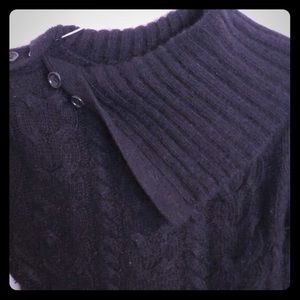 Cable knit sweater with adjustable buttons